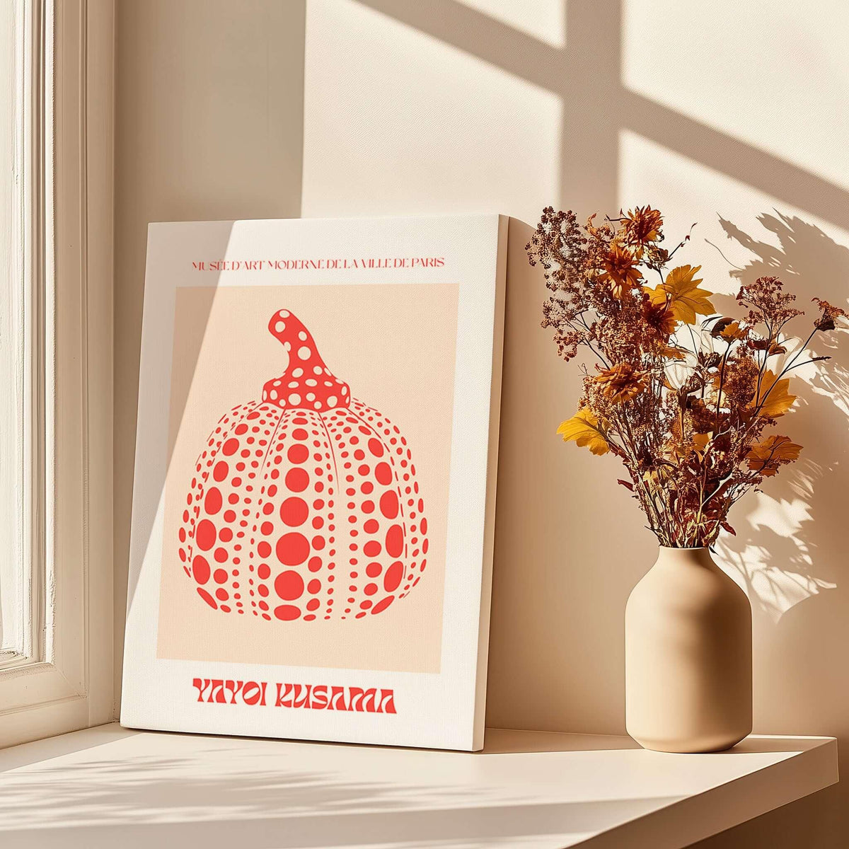 Yayoi Kusama Red Pumpkin Polka Dot Pop Art Print Poster Paris Exhibition Wall Art in a sunlit room with flowers.