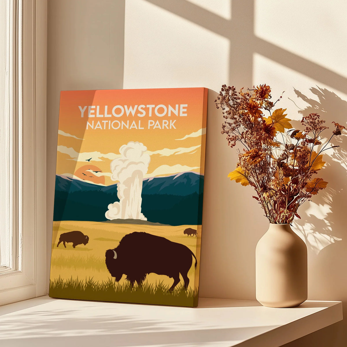 Yellowstone National Park canvas print with bison and geyser, styled by window with flowers