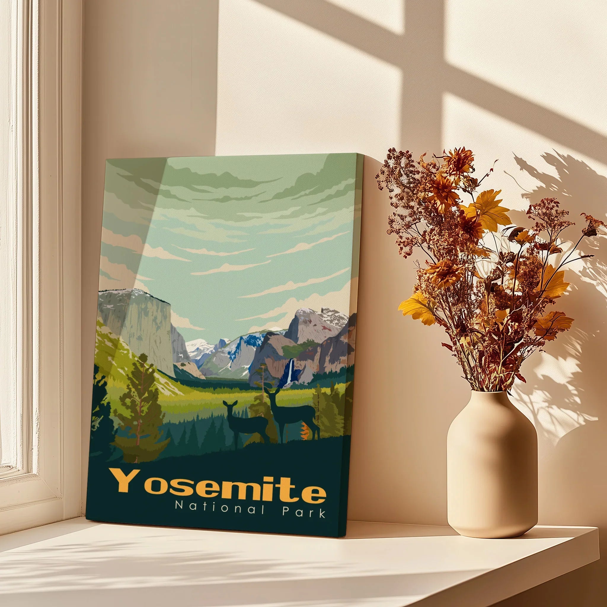 Yosemite National Park art print on windowsill with vase of dried flowers and sunlight
