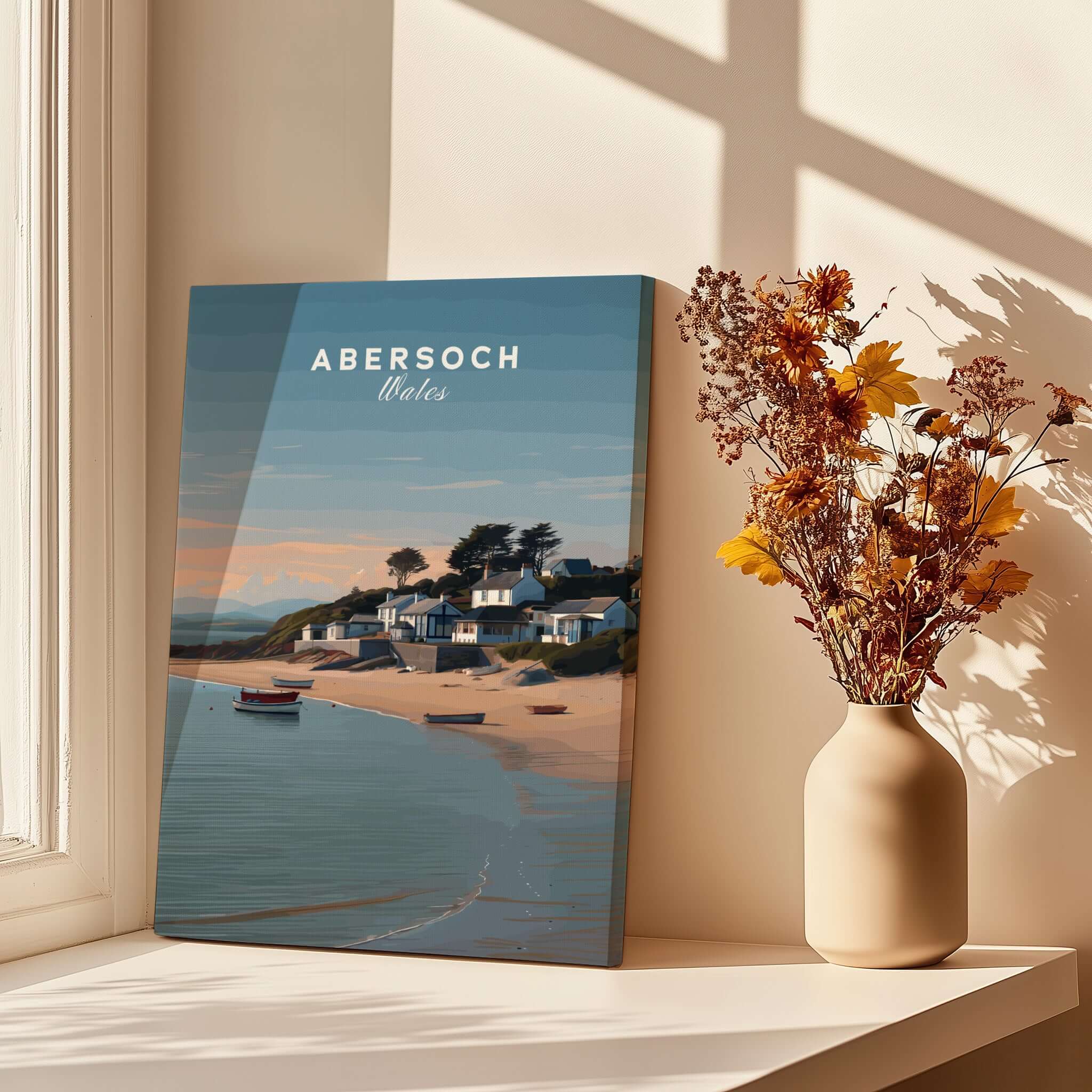 Abersoch Llyn Peninsula Shoreline View Canvas Print | Welsh Seaside Travel Poster displayed beside a vase of dried flowers.