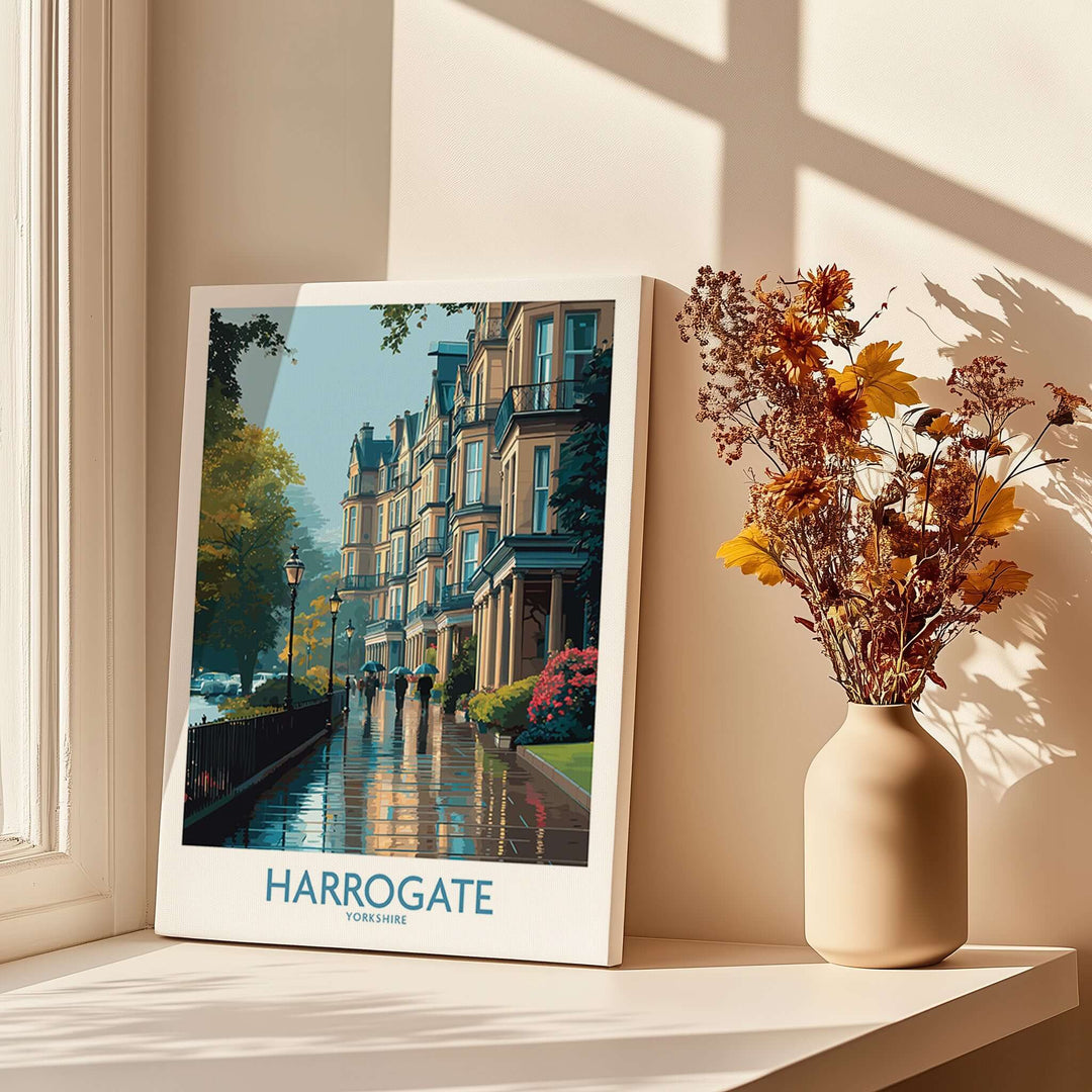 Harrogate Yorkshire Victorian Terrace Art Print | Rainy Street Poster displayed near a vase with dried flowers.