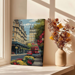Harrogate Print | English City Wall Decor featuring a vibrant street view with flowers and an iconic red bus.