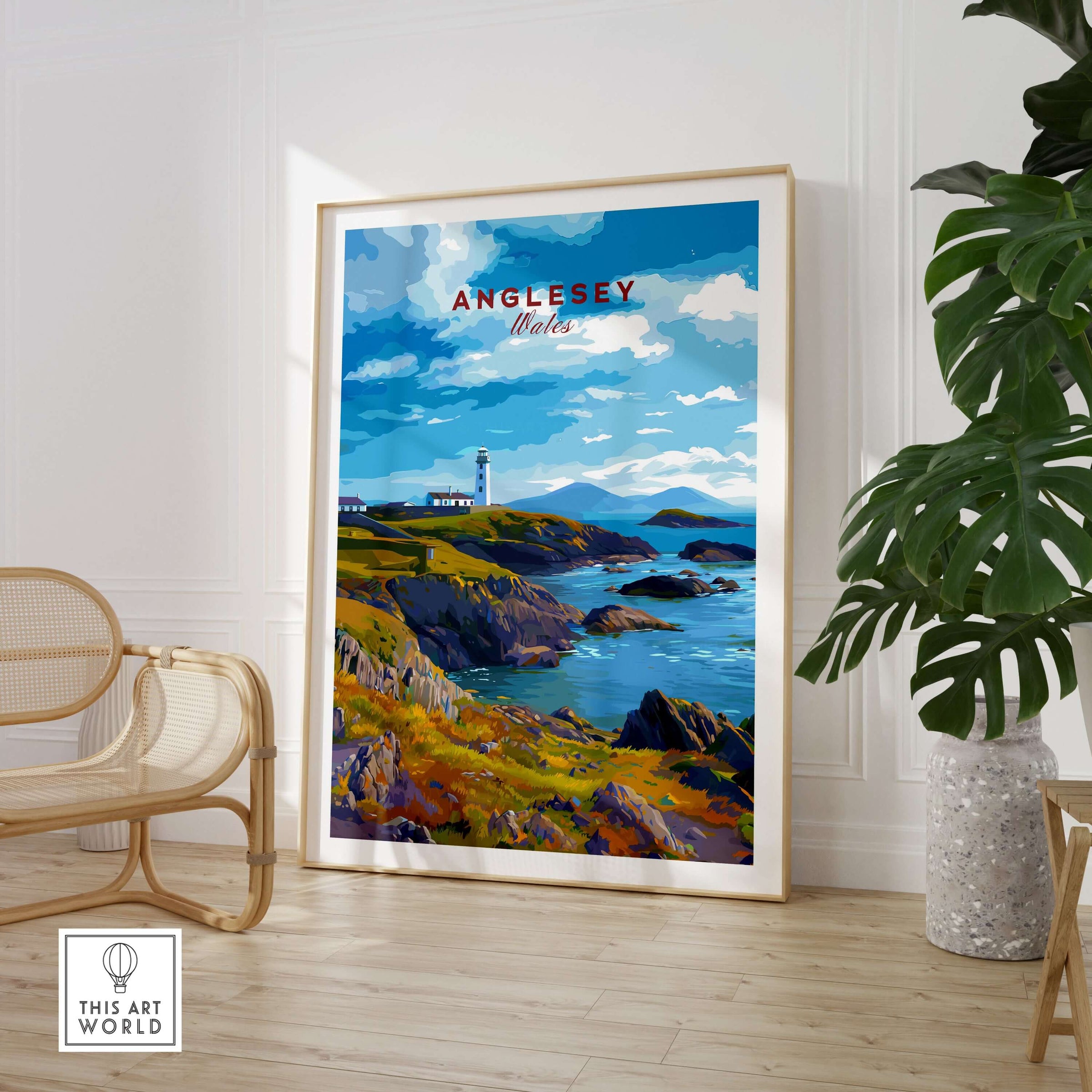 Anglesey Wales Poster Rocky Coast Lighthouse - Celtic Sea Wall Art displayed in a bright living room with coastal decor.