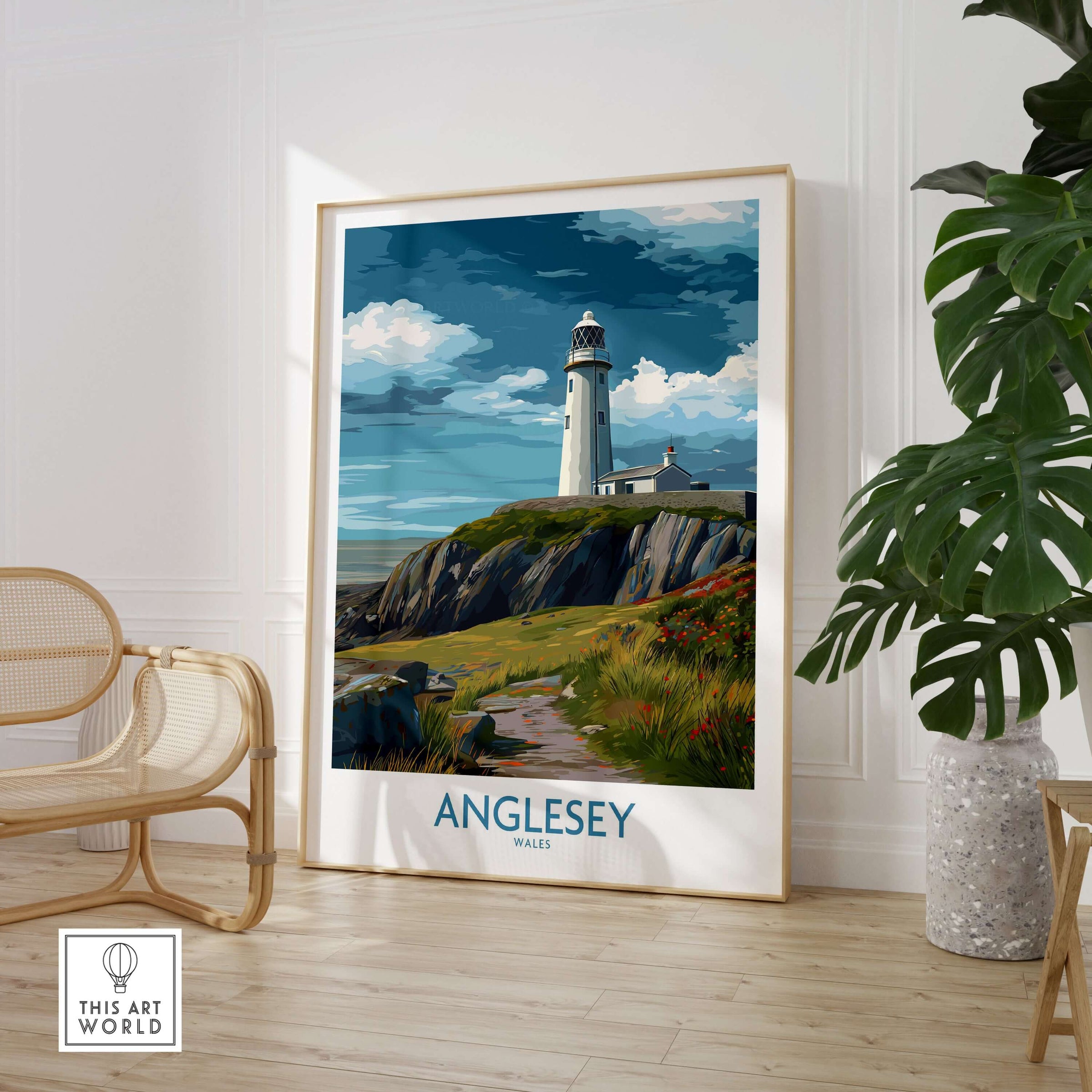 Anglesey Wales Scenic Seascape Poster - Welsh Lighthouse Decor in a stylish interior setting with a framed lighthouse artwork.