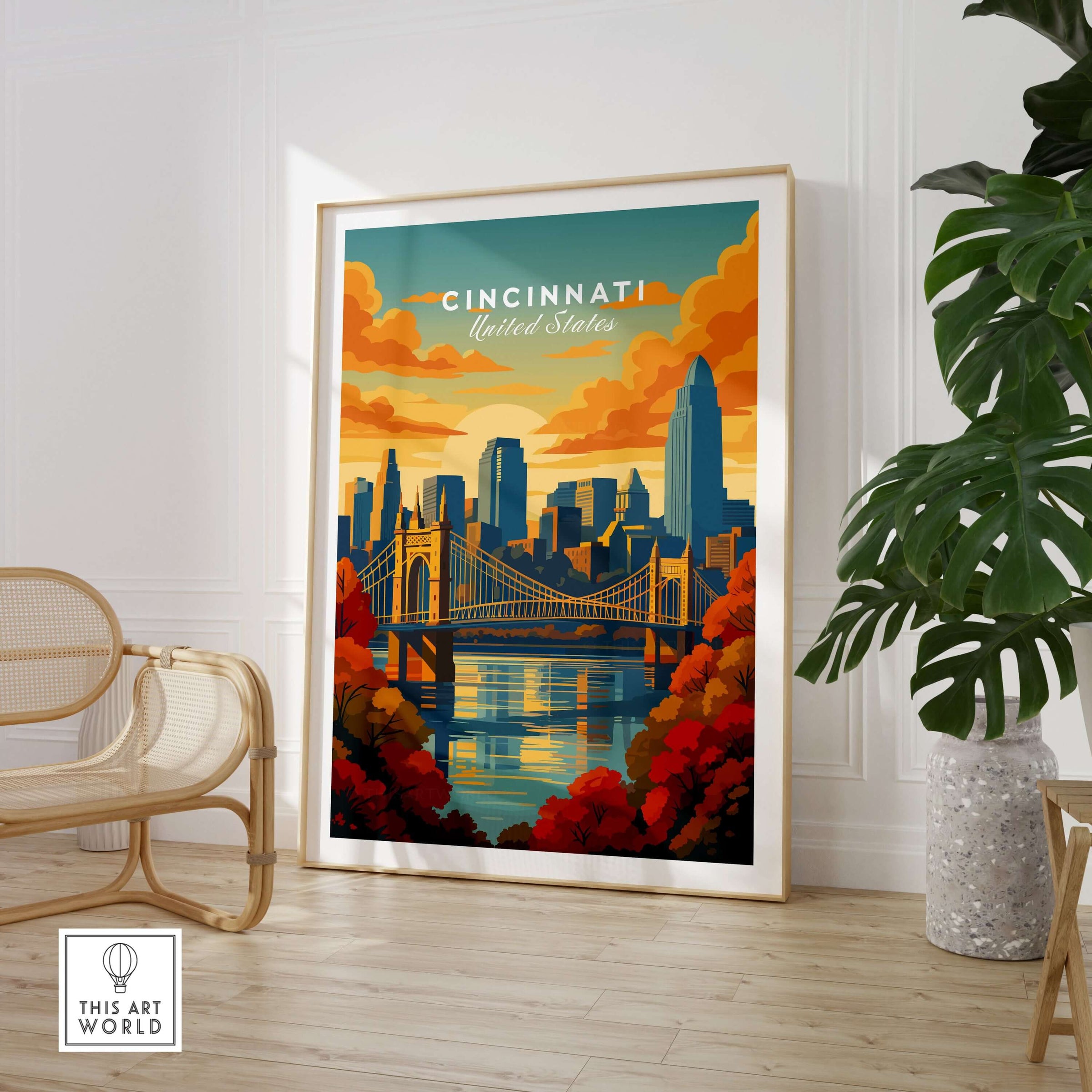 Cincinnati Sunset River Reflection Poster - Roebling Bridge Wall Art displayed in a stylish interior setting with tropical plants.