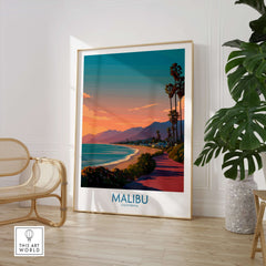 Malibu Poster California - California Beach Sunset Print displayed in a stylish interior with palm trees and coastline.