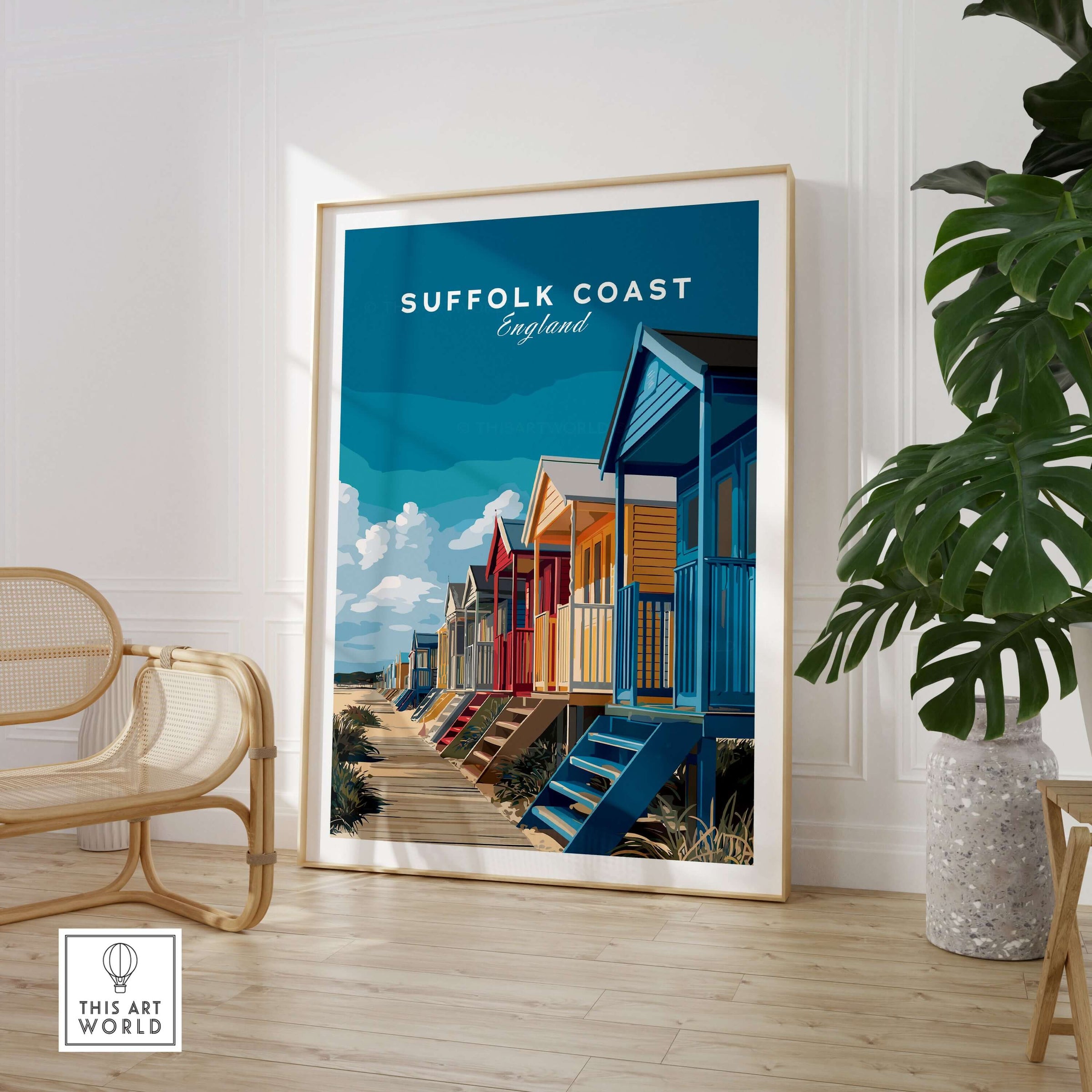 Suffolk Coast England Colorful Beach Huts Print - Vibrant Seaside Wall Art displayed in a stylish interior setting.