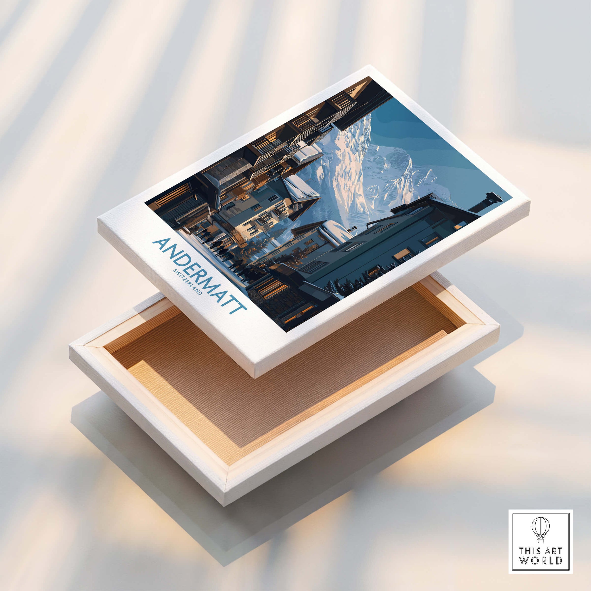 Andermatt Switzerland Wall Art Print displayed on a wooden box, showcasing picturesque alpine architecture.