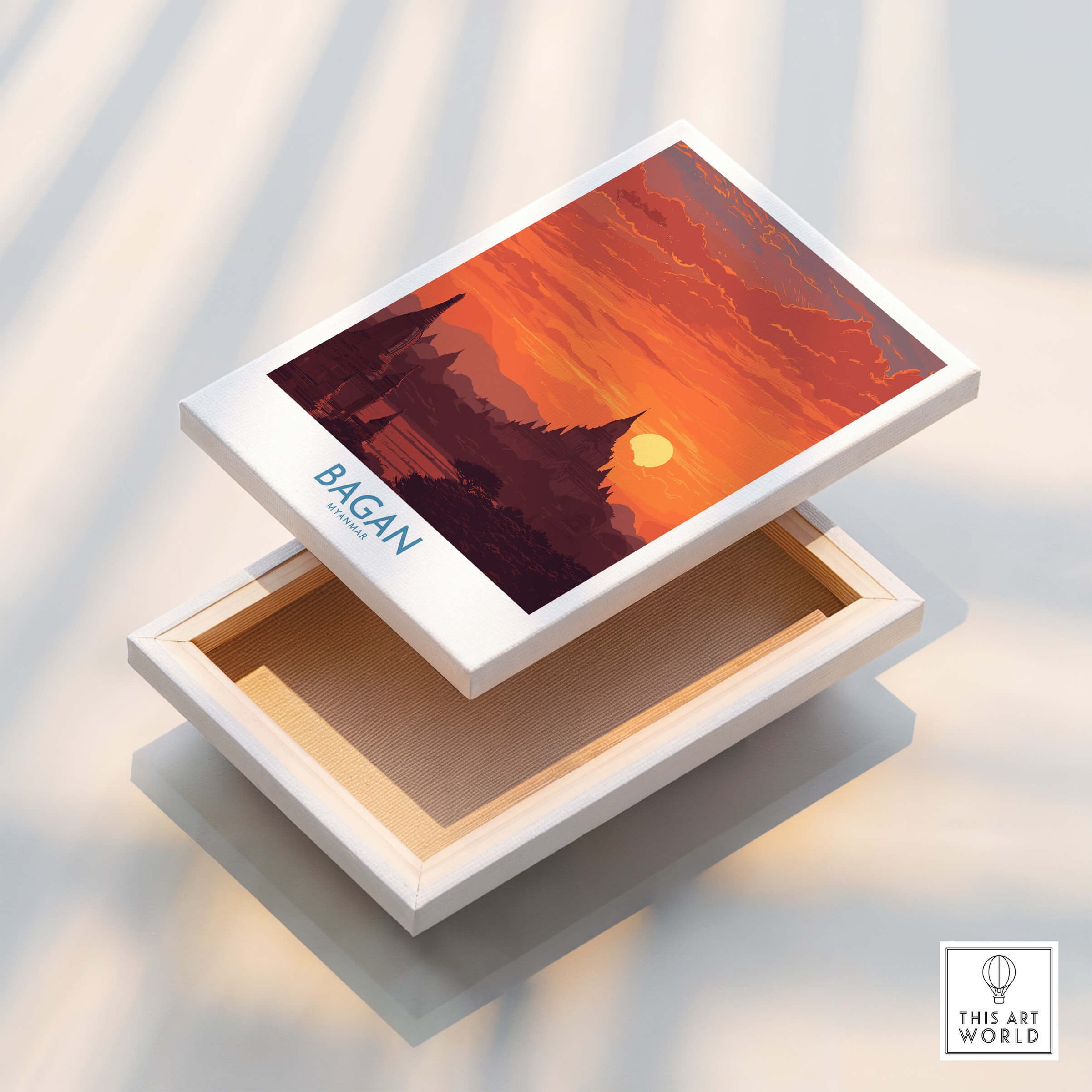 Bagan Myanmar Wall Art – Buddhist Pagoda Skyline Canvas Print displayed in a decorative box with sunset colors.