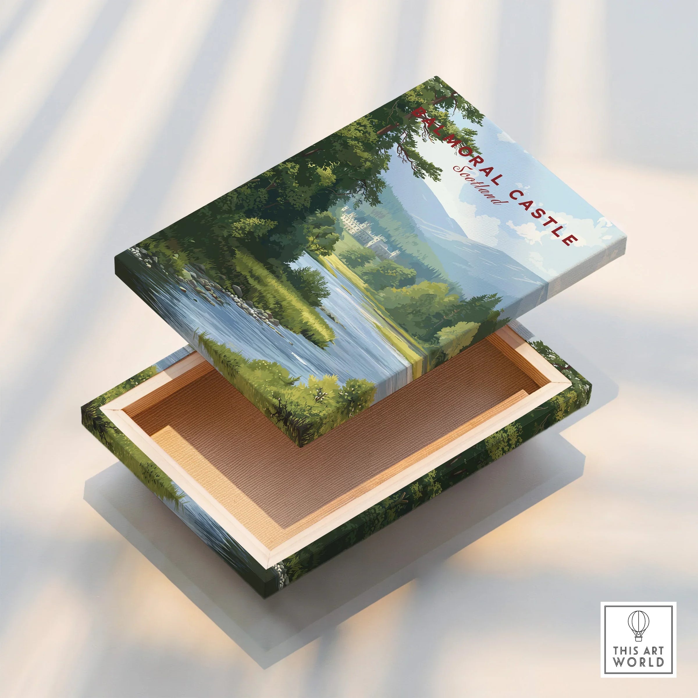 Stretched canvas print with Balmoral Castle landscape, open to reveal floating frame edge.