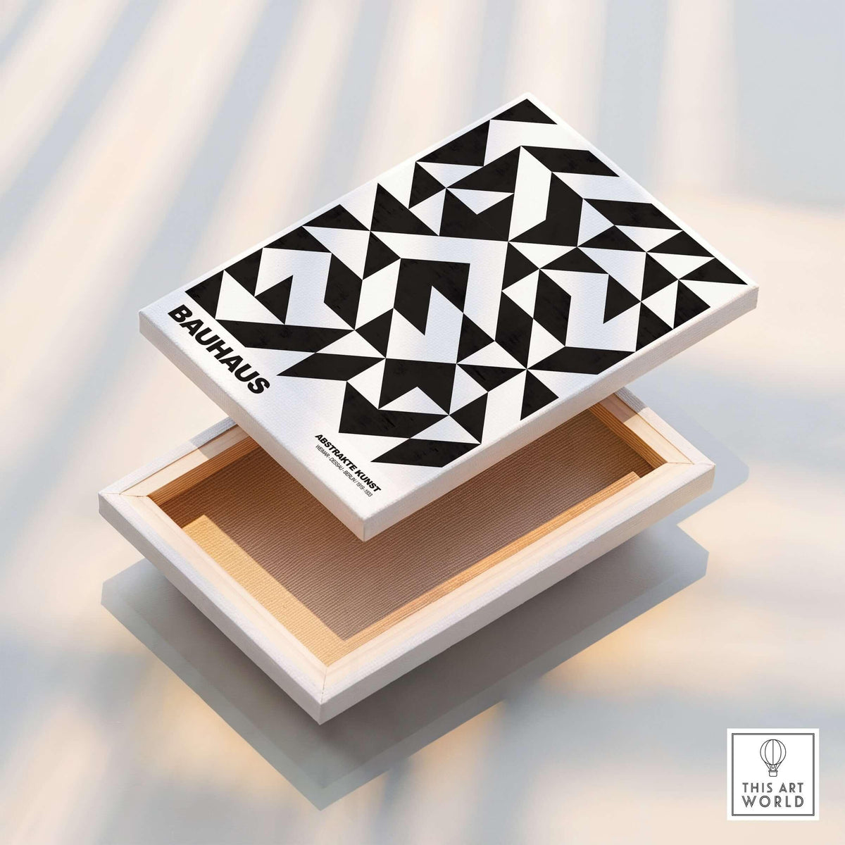 Bauhaus Exhibition Prints - Geometric Triangle Pattern Poster Black White Abstract displayed on a white box.