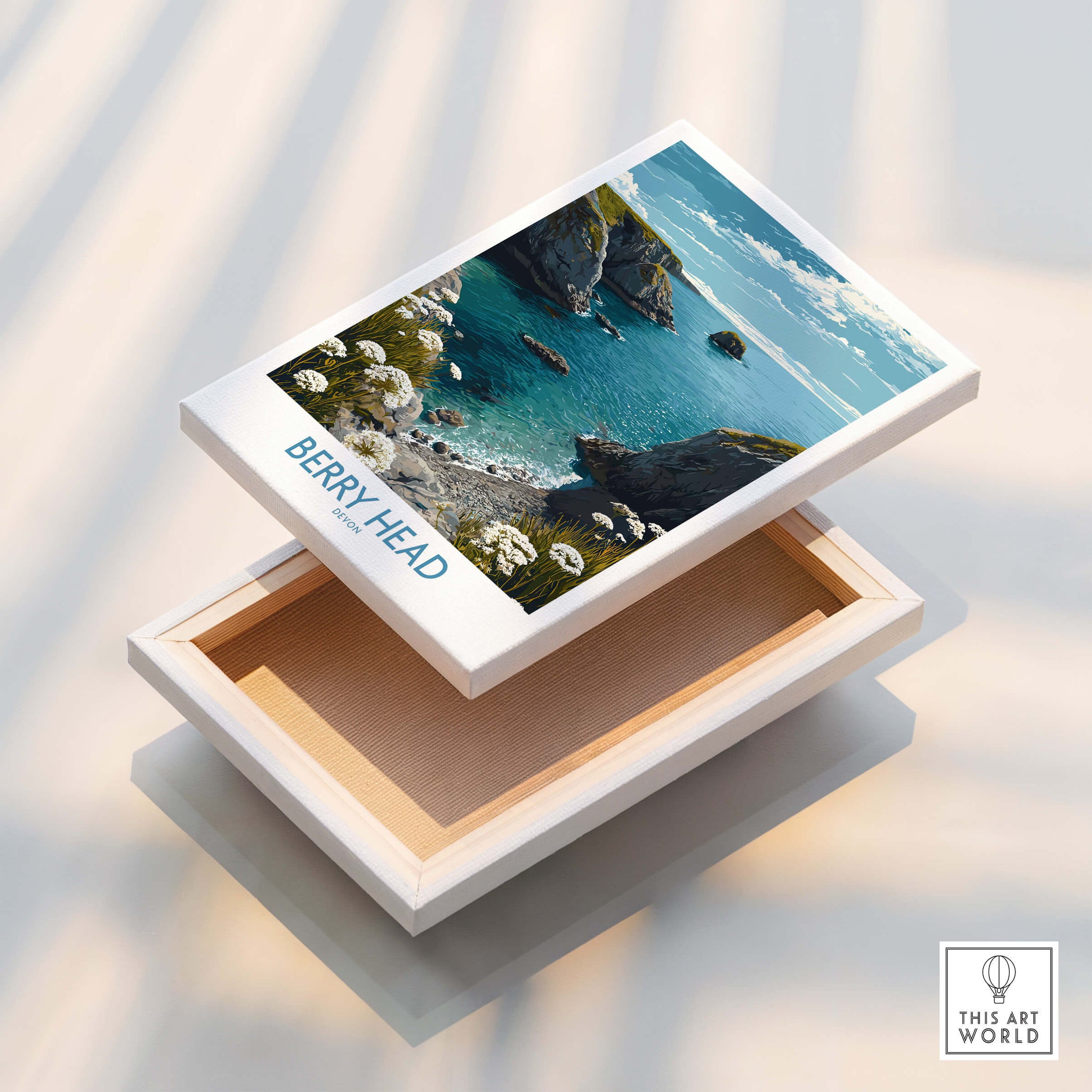 Berry Head Devon Print – Rocky Cliffs and Turquoise Sea Wall Decor displayed on an open box, showcasing coastal beauty.