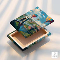 Bristol Travel Poster – Cityscape and Clifton Suspension Bridge Print displayed on a decorative box with vibrant design.