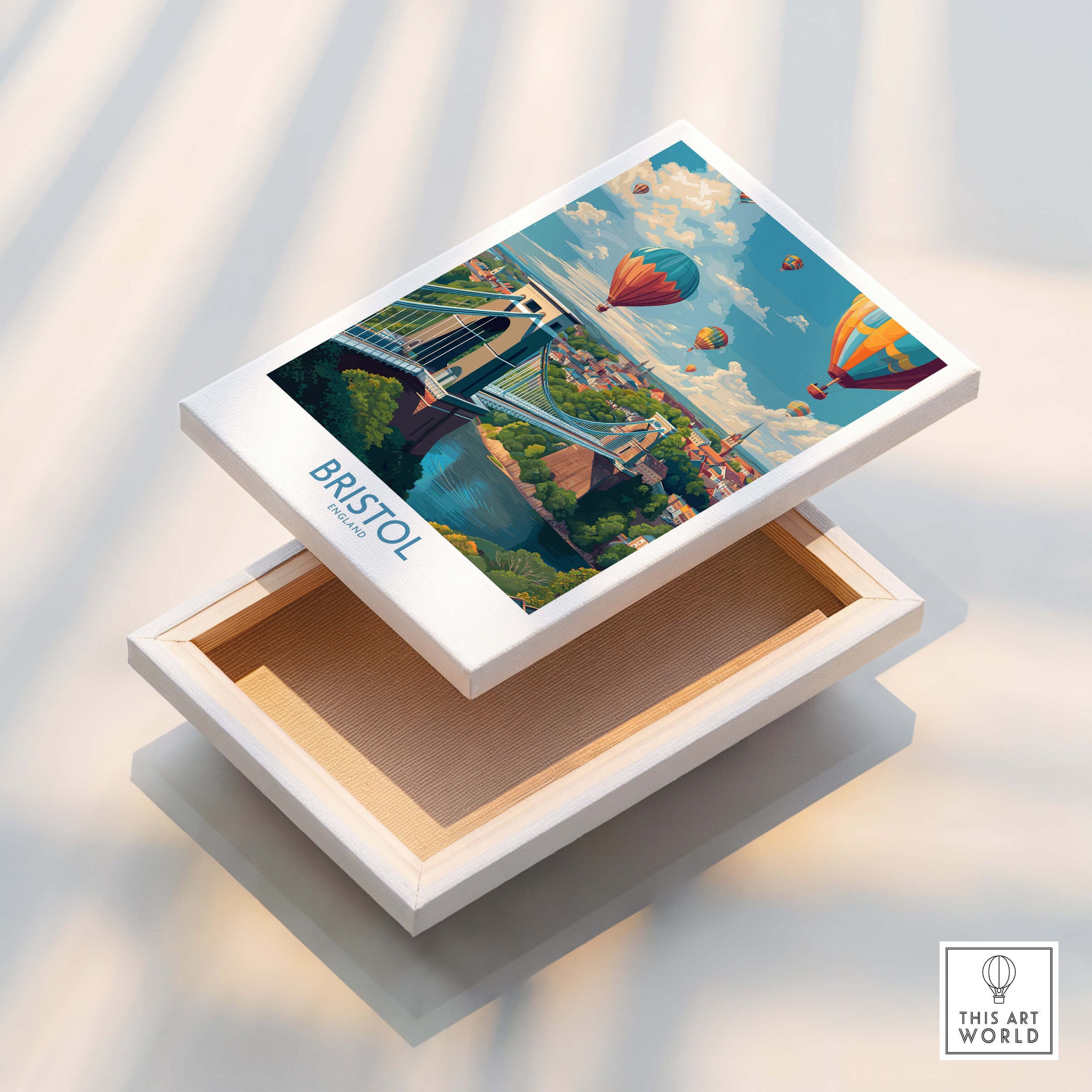 Bristol England Print – Hot Air Balloons Over Historic City Wall Art displayed on a wooden box with an open lid.