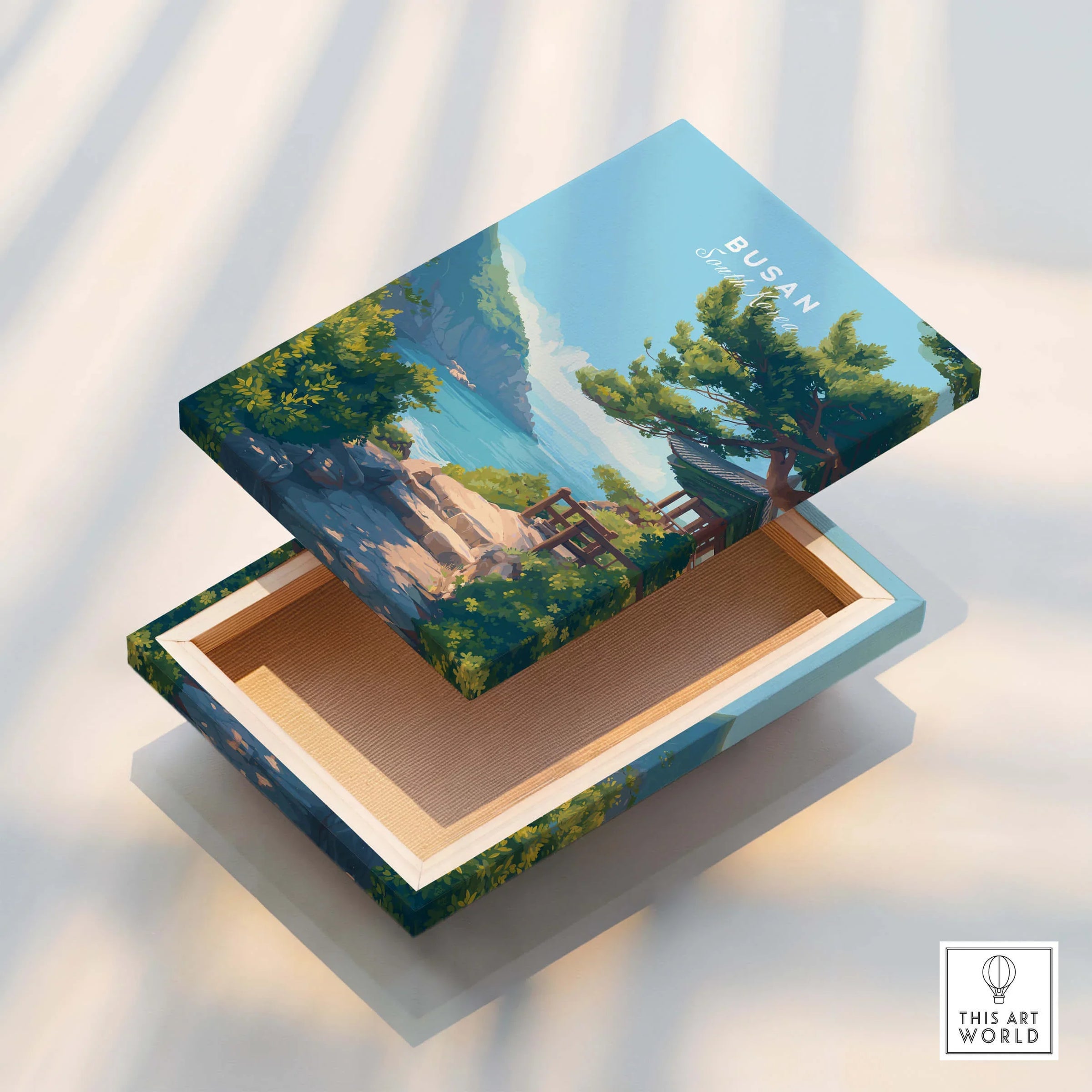 Busan art print box with coastal landscape, blue sky, pine trees, and sea view design