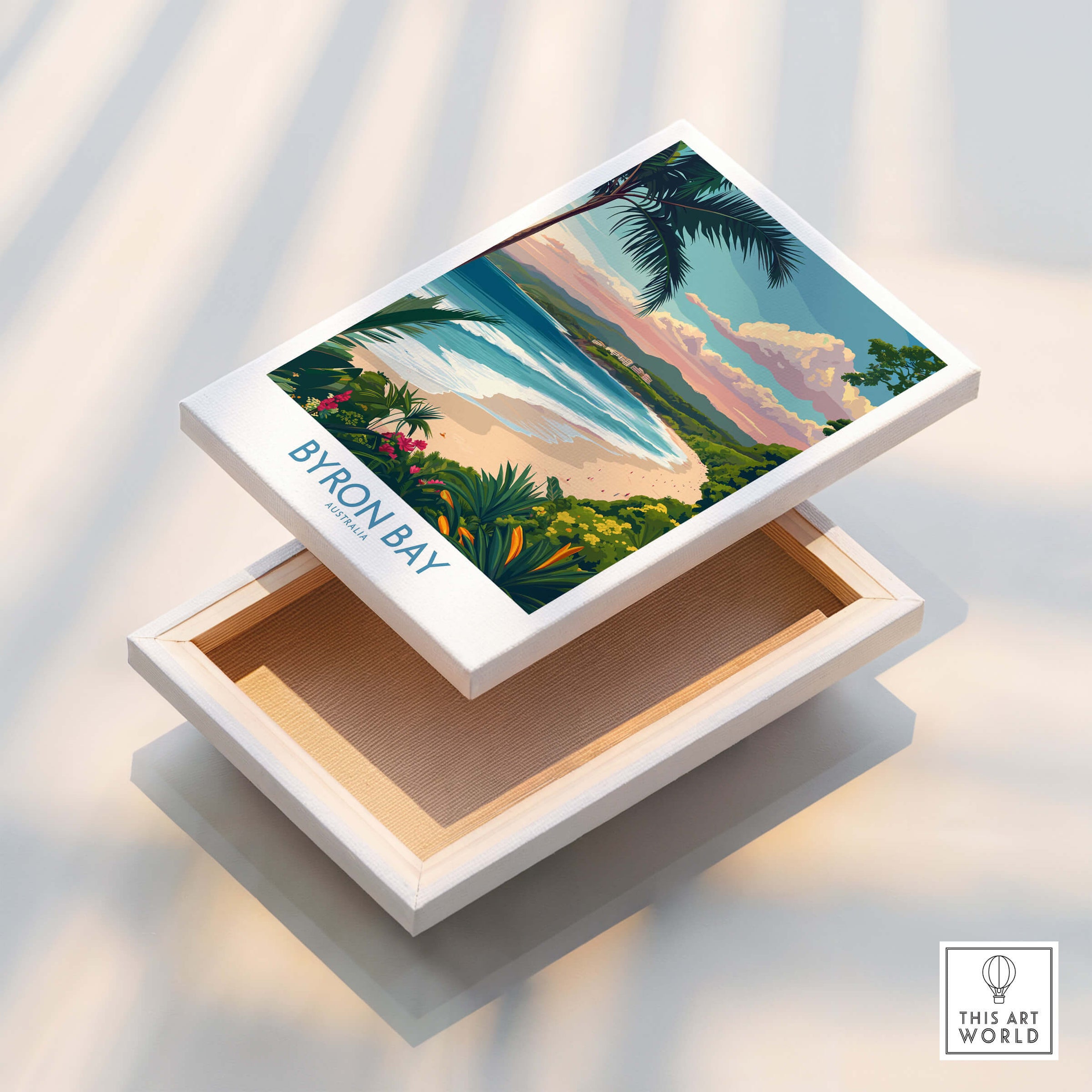 Byron Bay Poster - Australia Wall Art displayed on a wooden box showcasing the scenic beauty of Byron Bay.