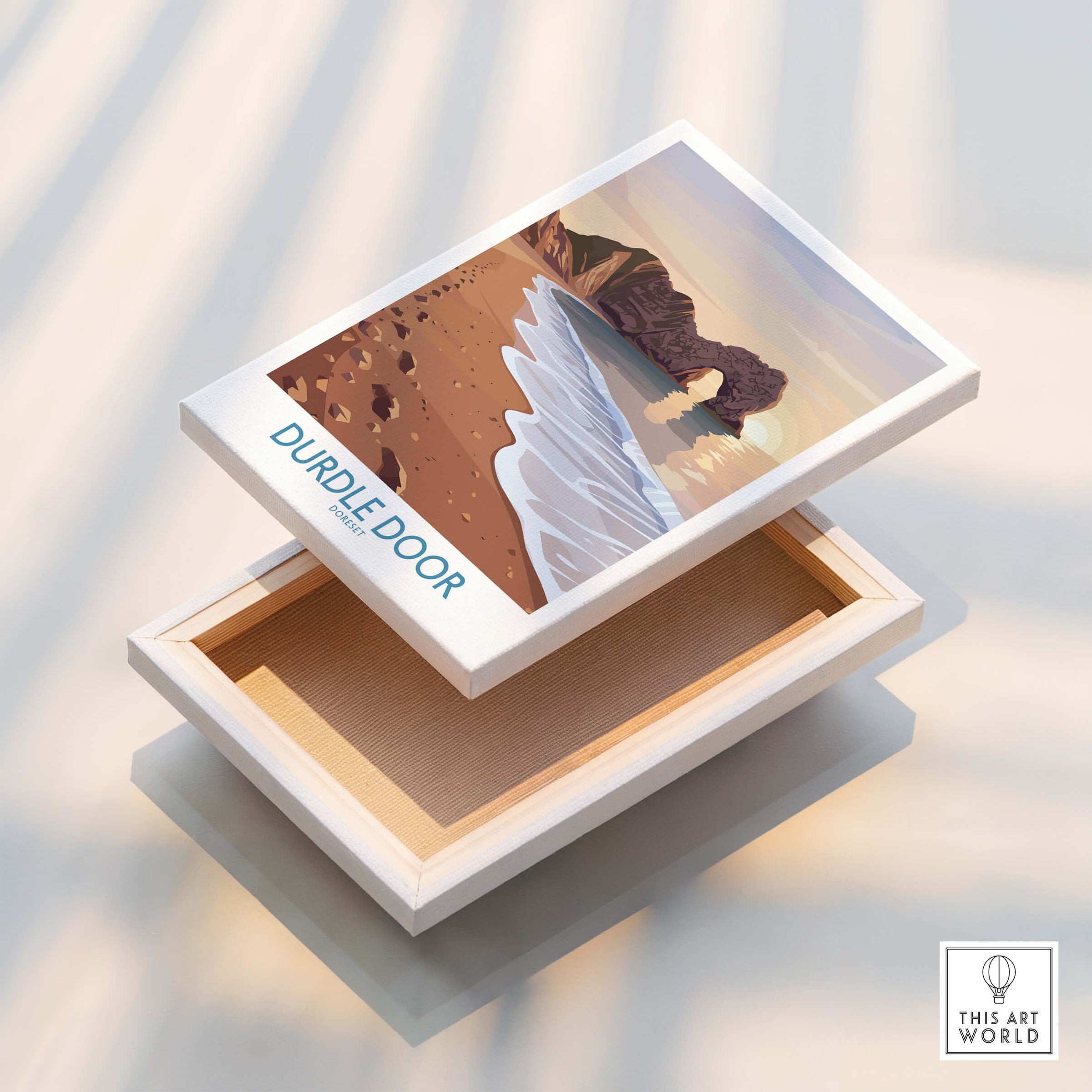 Durdle Door Dorset Wall Art – Canvas Poster displayed on a decorative box, showcasing stunning coastal art.