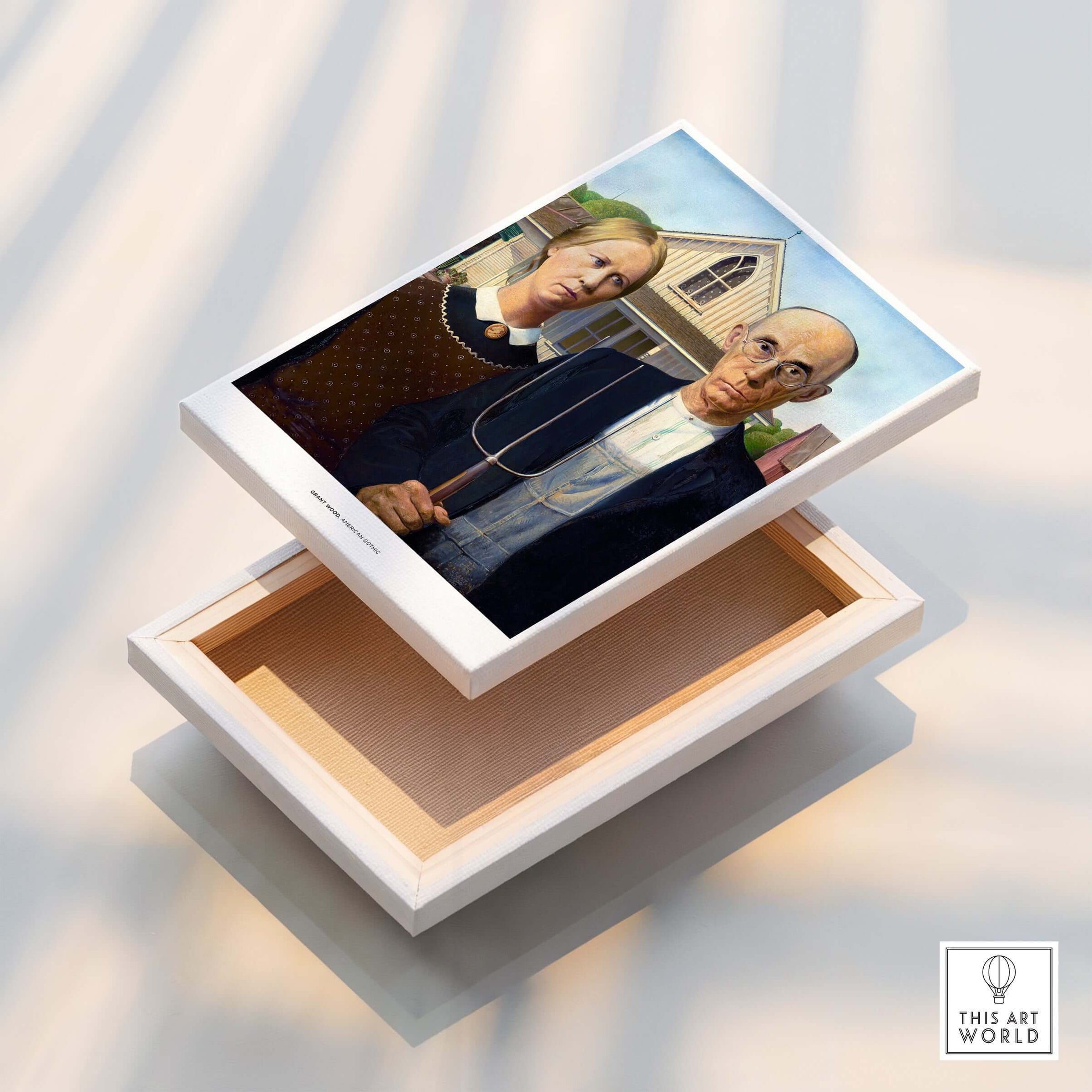 Exhibition Art Print American Gothic Grant Wood Famous Painting Wall Art Poster displayed on a box.