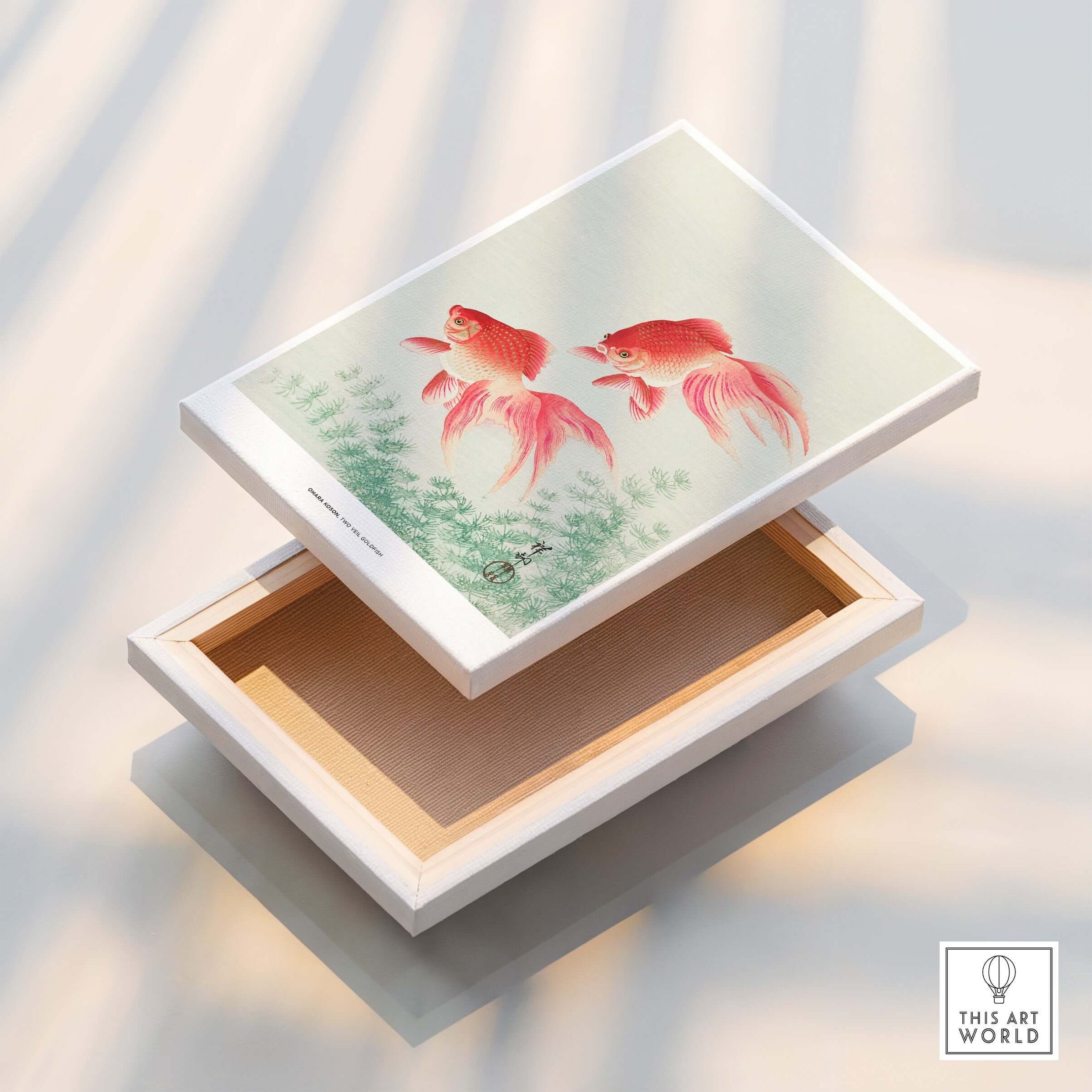 Exhibition Art Print Ohara Koson Two Veil Goldfish Japanese Fish Poster on a decorative box.