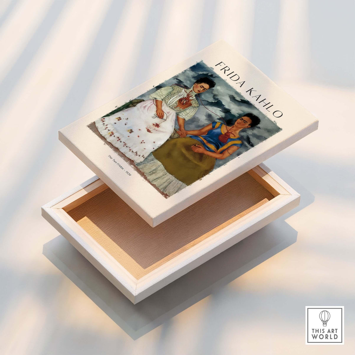 Frida Kahlo The Two Fridas Famous Art Print Poster Wall Art on a decorative box with a wooden interior.