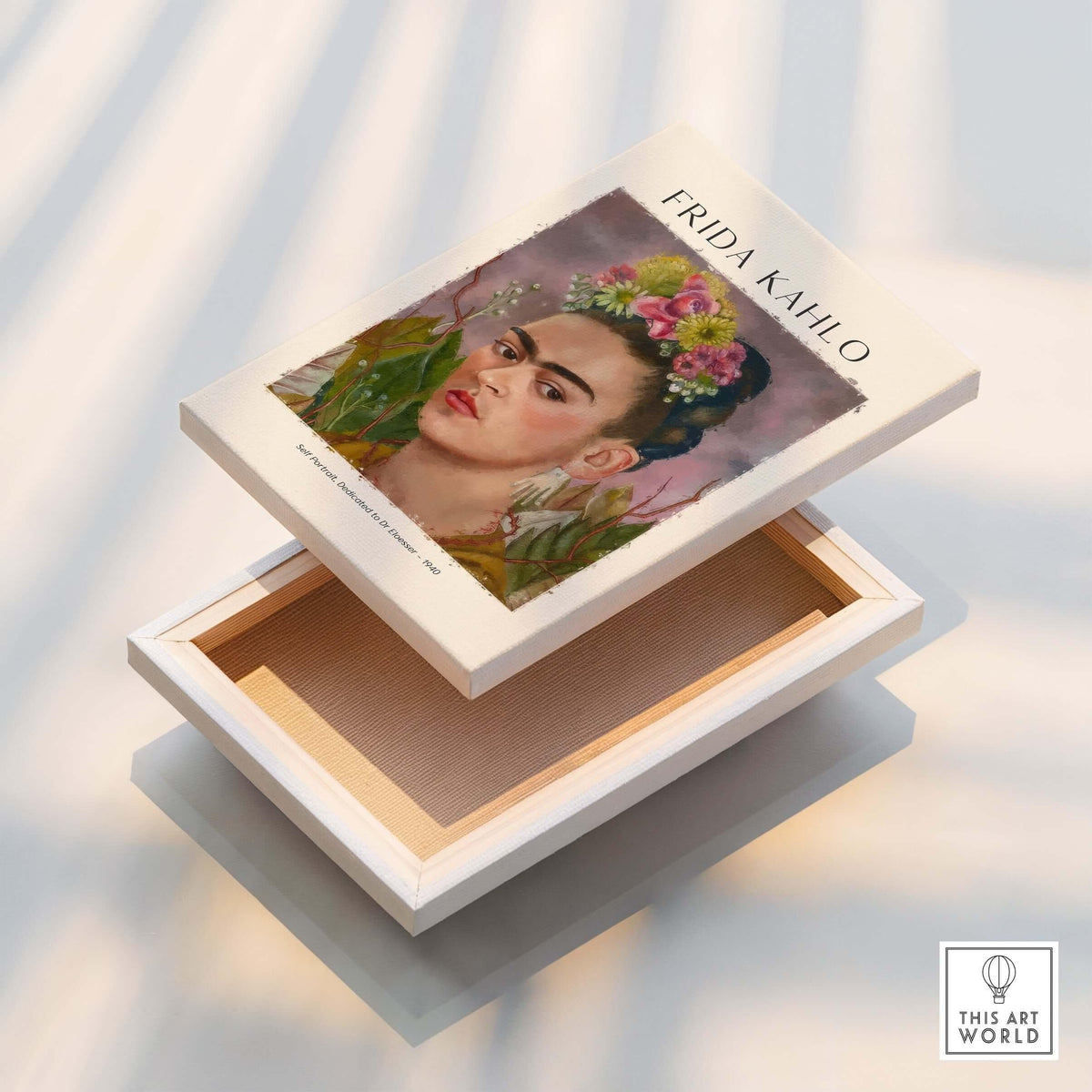 Frida Kahlo Self Portrait Dedicated Dr Eloesser Floral Poster Art Print displayed on a box with floral design.