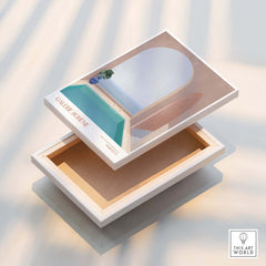 Galerie Bohème Moroccan Pool Ocean Archway Art Print Mediterranean Poster displayed on a white box with natural wood interior.