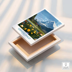 Grindelwald Switzerland Canvas Print | Scenic Swiss Village Landscape Poster displayed on a wooden box with floral design.