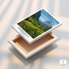 Grindelwald Switzerland Posters | Lush Green Mountain Valley Canvas Print displayed on a white box