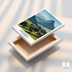 Gruyères Switzerland Canvas Print | Charming Swiss Countryside Scenery Poster displayed on a wooden box.