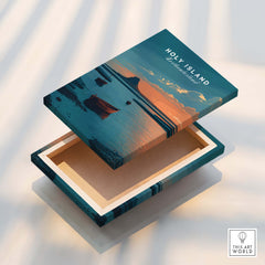 Holy Island Northumberland Wall Art Print | Lindisfarne Sunset Travel Poster displayed on a decorative wooden box.