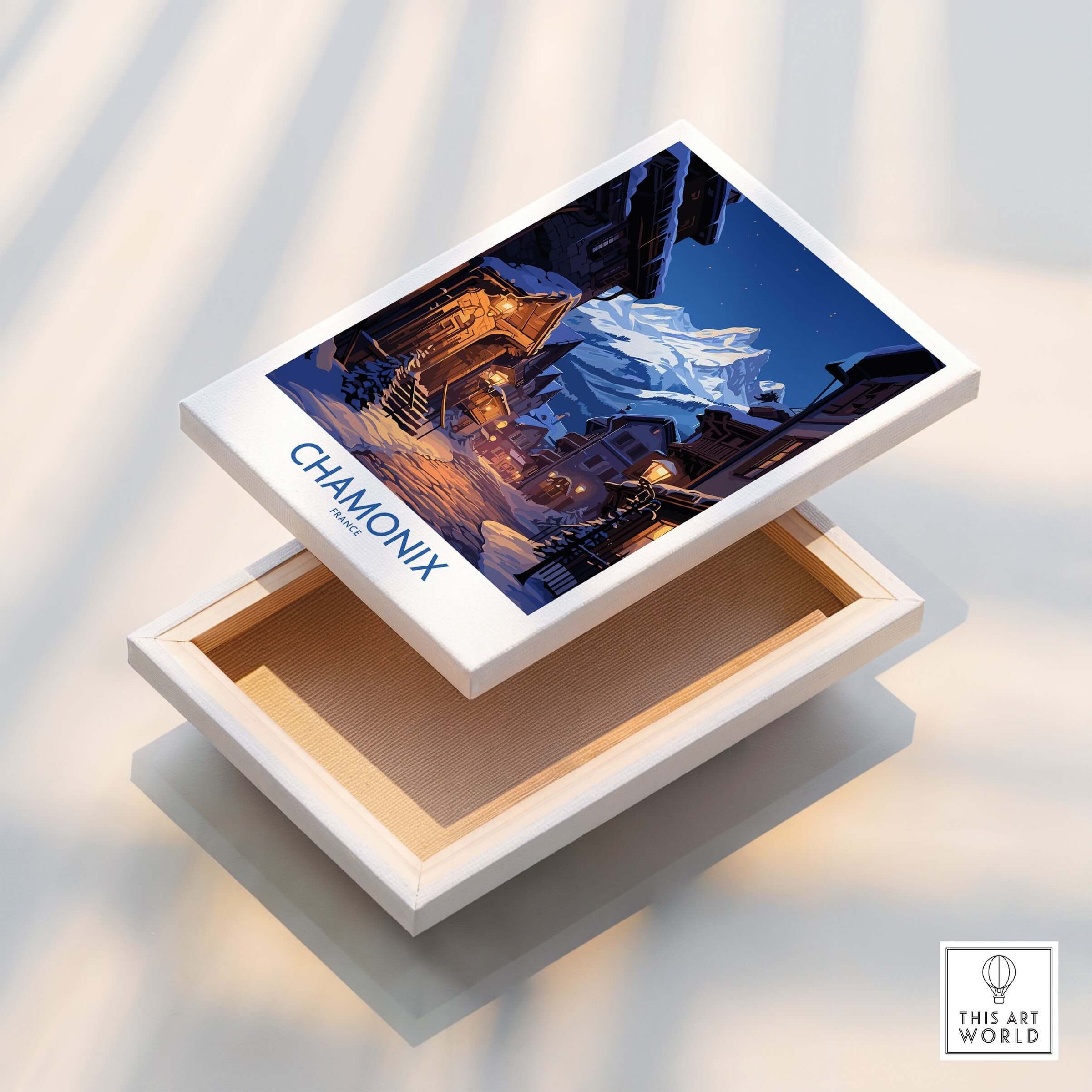 Chamonix Print ski poster displayed on an open box, showcasing the beautiful mountain scenery and ski village design.