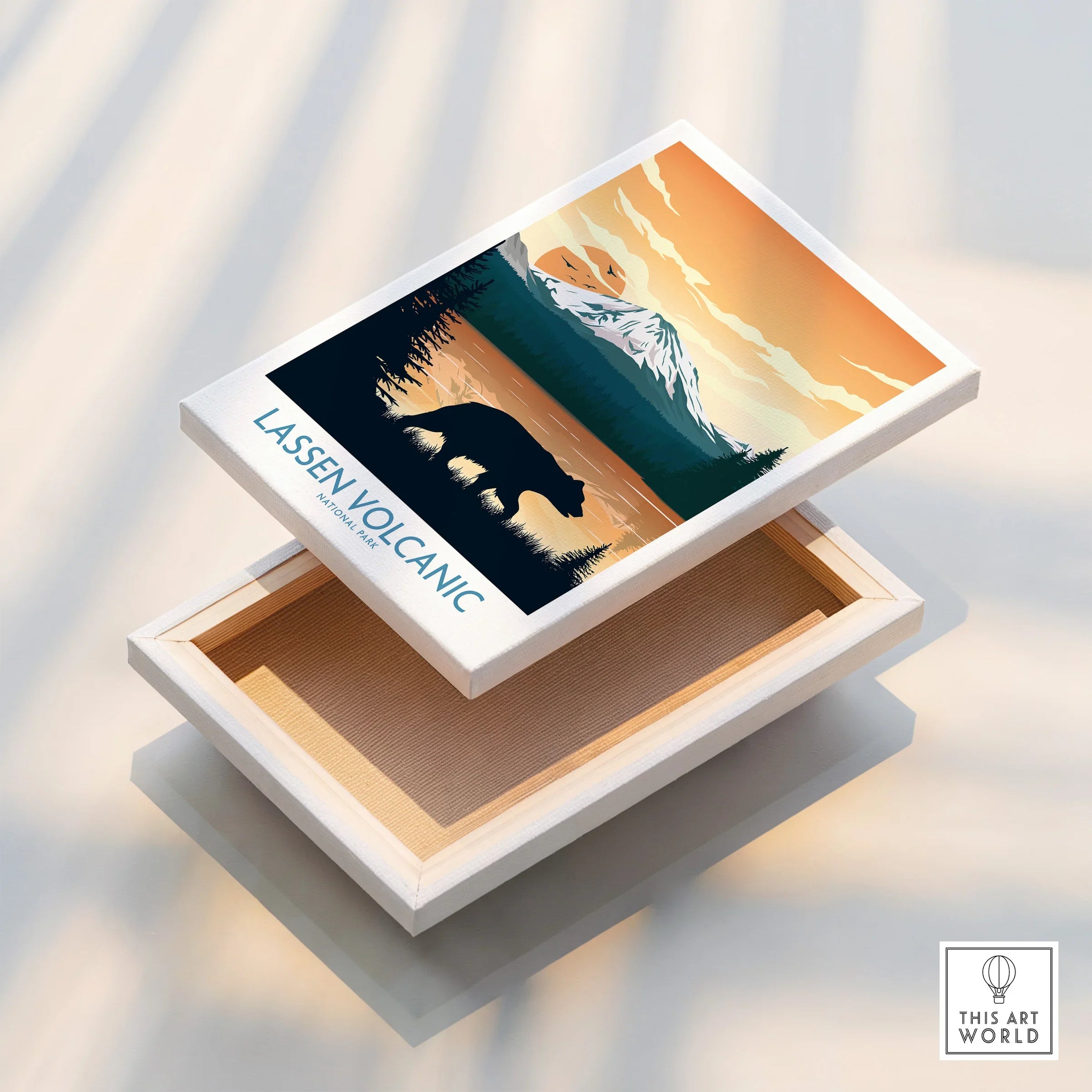 Lassen Volcanic National Park print on stretched canvas with bear silhouette and snow-capped mountain.