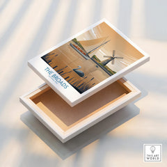 Stretched canvas print featuring The Broads National Park with a sailboat, windmill, and swan.