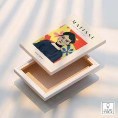 Matisse Art Prints - Woman Portrait Abstract Floral Poster displayed on a box, featuring bright, colorful artwork.