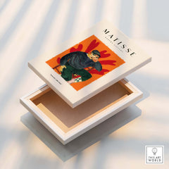 Matisse Art Prints - Seated Figure in Cap Poster displayed on an open box, showcasing vibrant colors and bold design.