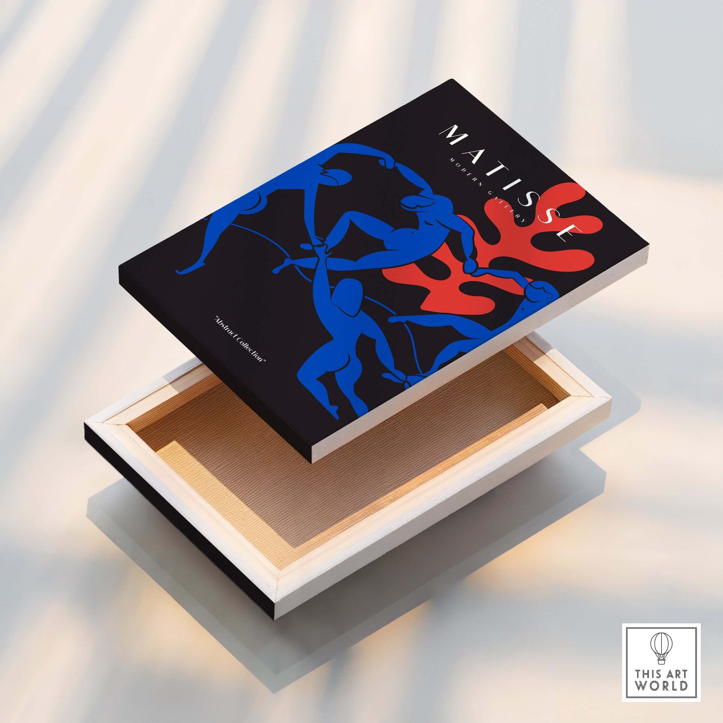 Matisse Art Prints -  Dance Blue Figures Poster displayed on a canvas, showcasing vibrant blue figures and a coral design.