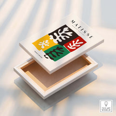 Matisse Art Prints - Four Blocks Abstract Leaves Color Poster displayed on a wooden box showcasing vibrant colors and designs.