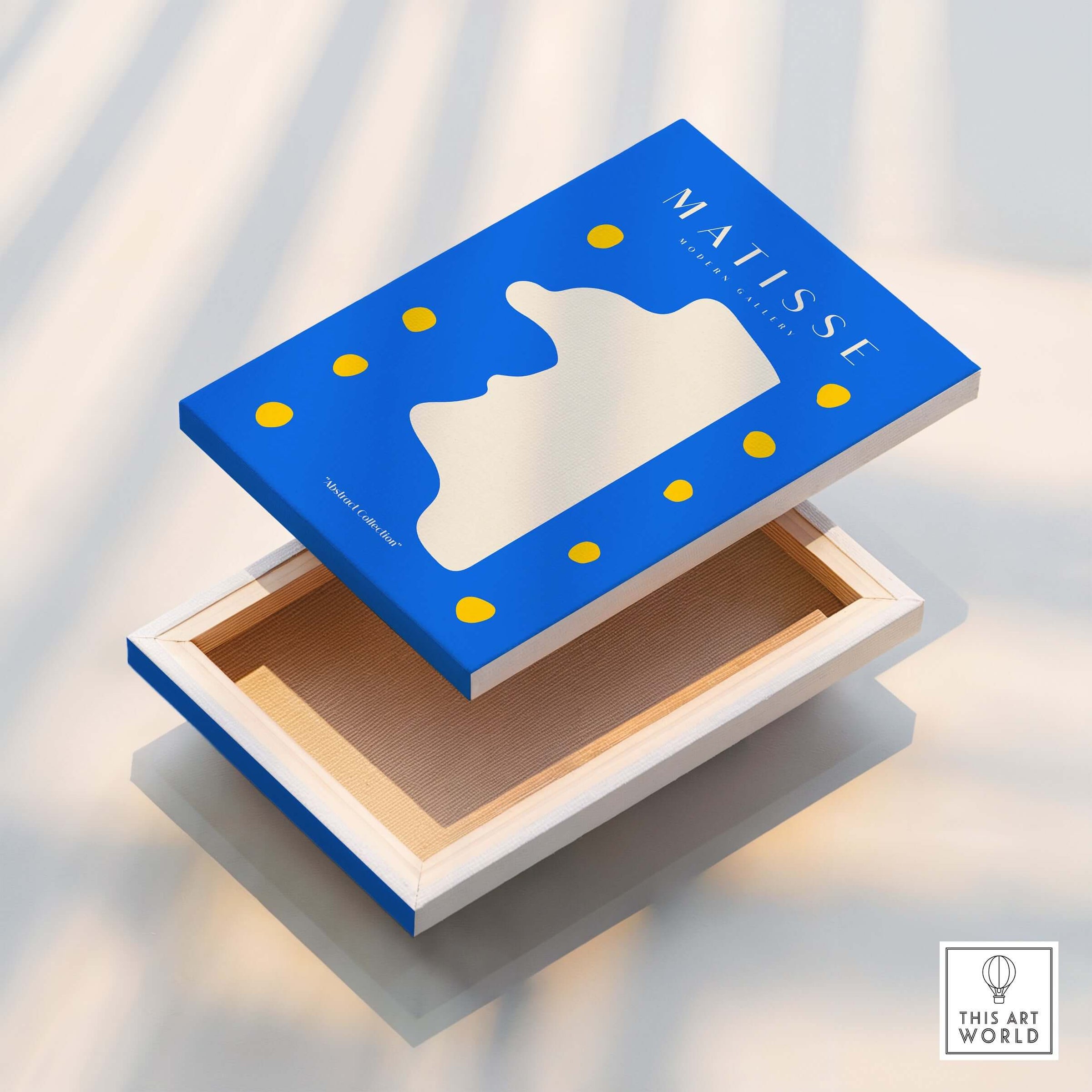 Matisse Art Prints -  Blue Abstract Profile with Yellow Dots Poster displayed on a box with abstract design.