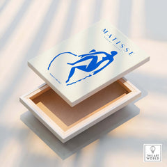 Matisse Art Prints -  Blue Nude Seated Figure Poster displayed on an open art box with a minimalist design.