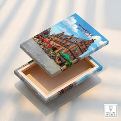 Canvas print box featuring Nijmegen Netherlands cityscape art with vibrant street scene.