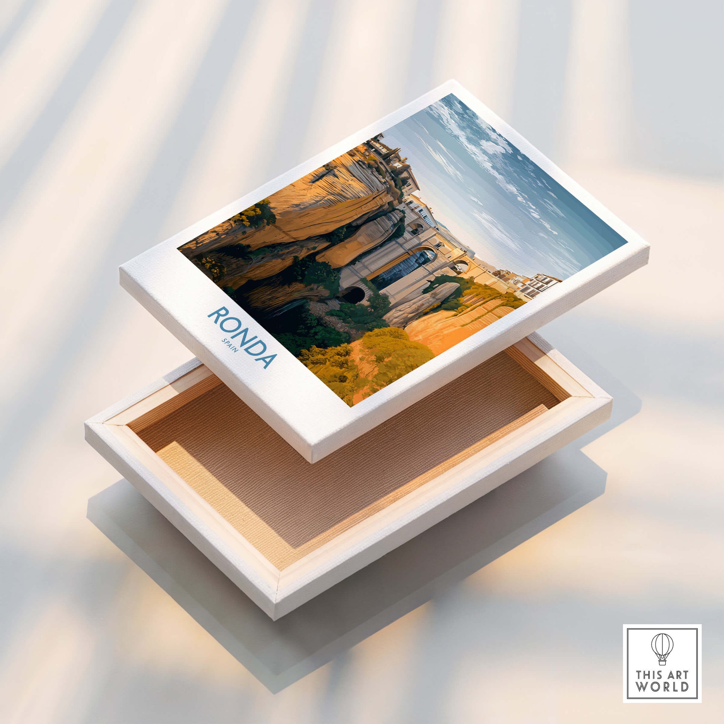 Ronda Spain Poster | Iconic Stone Bridge & Valley View Canvas Print on a decorative box.