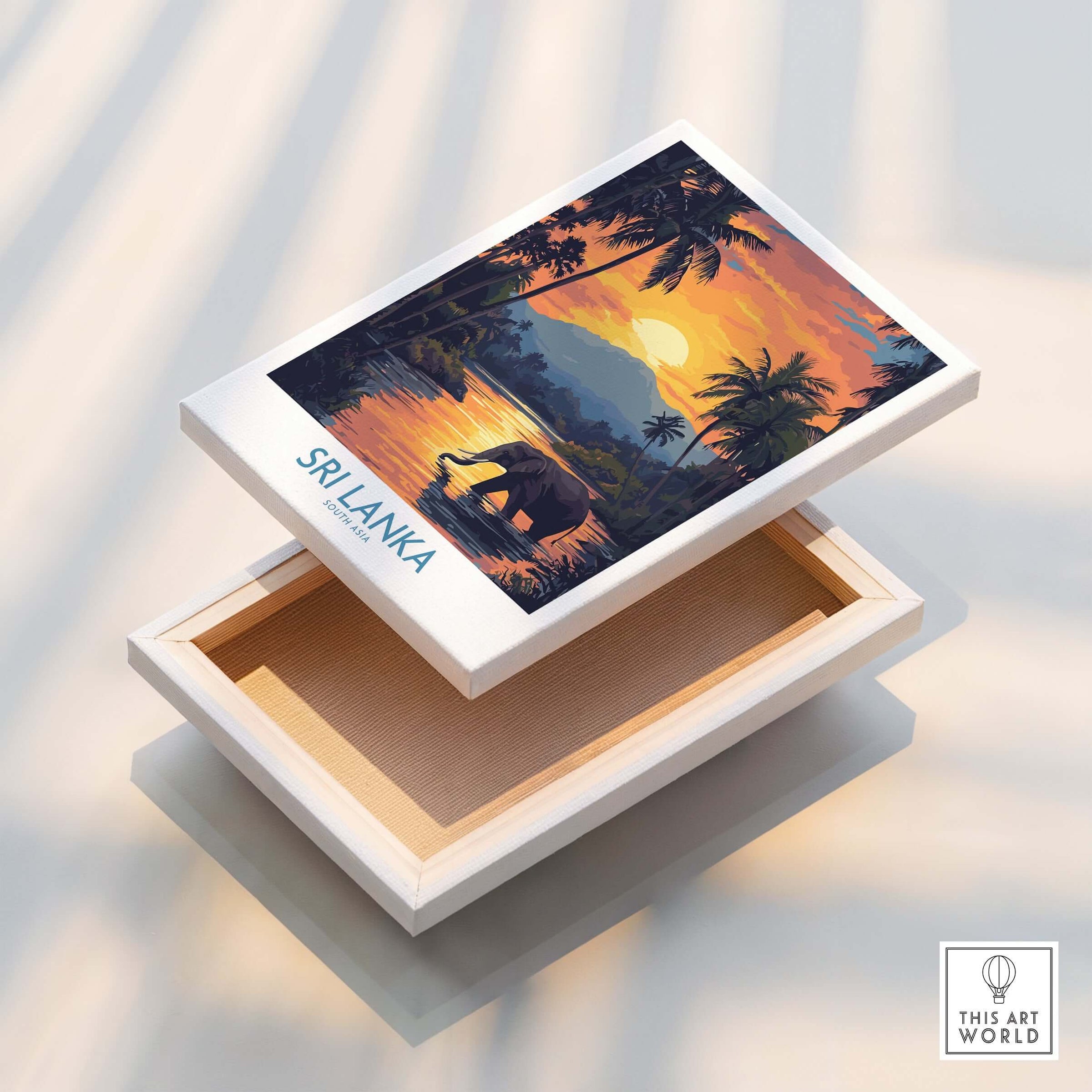 Sri Lanka Poster with Elephant in tropical setting at Sunset - Travel Print displayed on an open box.