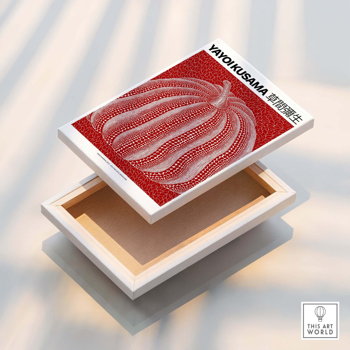 Yayoi Kusama Red White Pumpkin 2013 Singapore Exhibition Art Print Poster Polka Dot displayed on a wooden box.