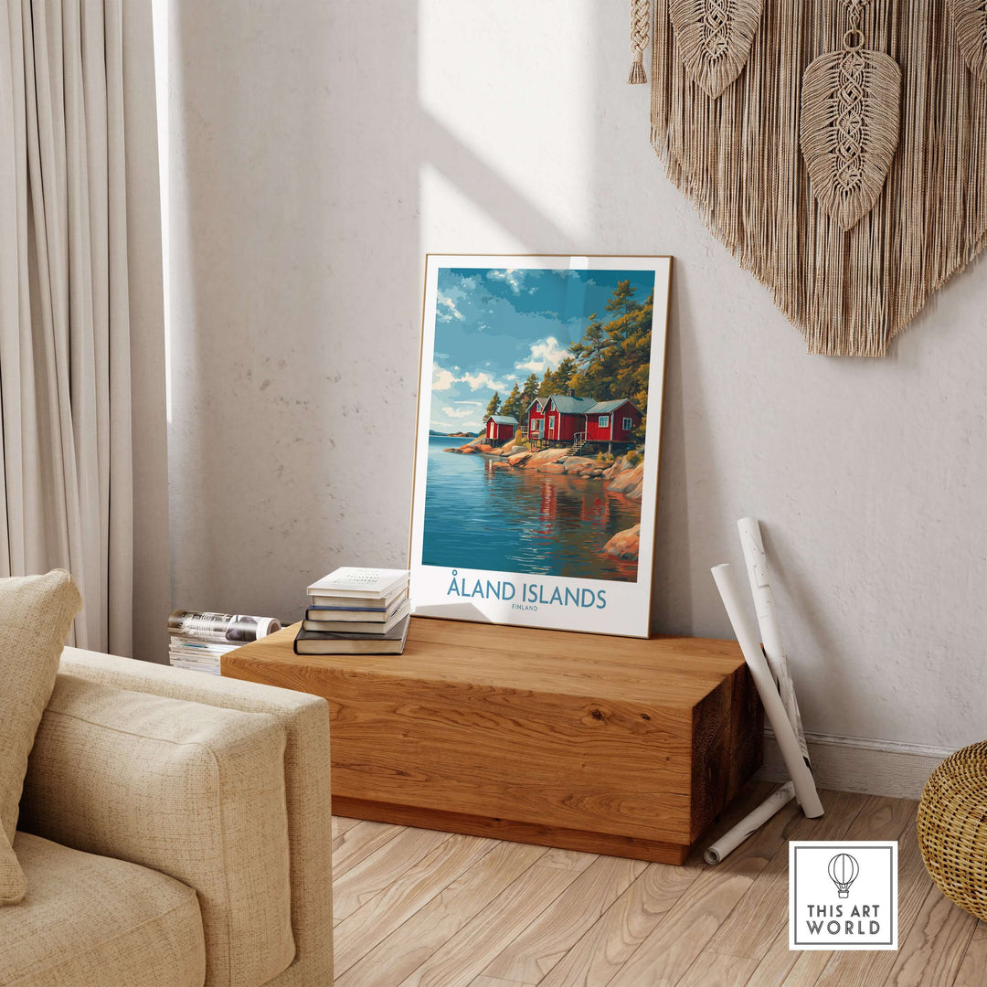 Åland Islands Lakeside Cabin Art Print | Finland Rustic Landscape Poster displayed in a cozy living room setting.