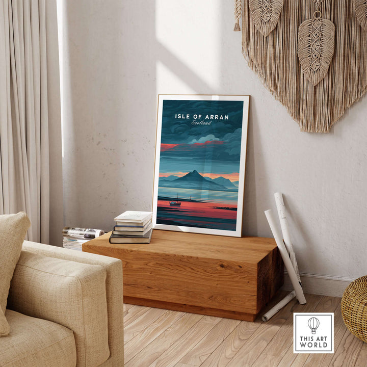 Isle of Arran print featuring a mountain sunset, displayed in a modern living space with natural decor.