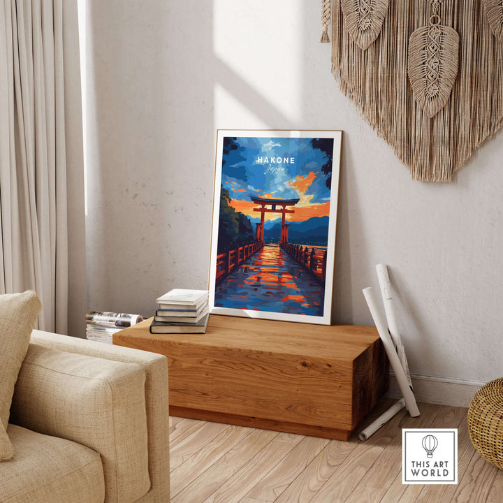 Vibrant Hakone wall art featuring a Torii gate at sunset, reflecting on Lake Ashi, displayed in a cozy living room.