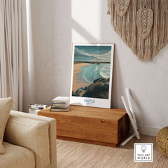 Hayle Sandy Beach Poster - Cornish Travel Decor displayed in a cozy living room with natural decor elements.