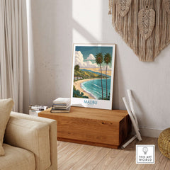 Malibu California Poster - Beach Print displayed in a cozy living room, featuring iconic Malibu coastal views and palm trees.