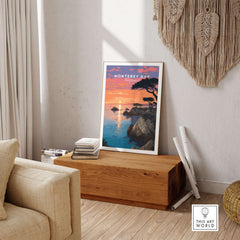 Monterey Bay Print California - Pacific Grove Wall Art displayed in a cozy living room with sunset hues.