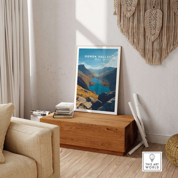 Ogwen Valley wall art print showcasing Wales' mountain lakes and Snowdonia landscape in a cozy living room setting.
